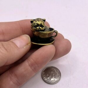 Adorable solid brass kitten in a cup statuette, little metal cat figurine.